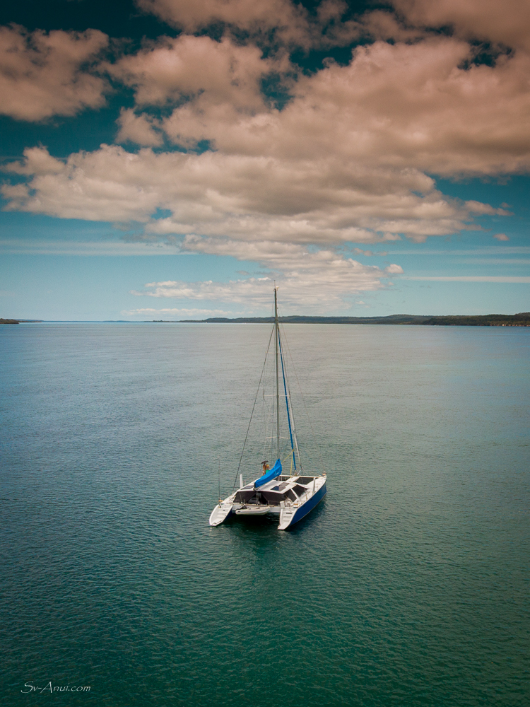 Anui anchored off White Cliffs, Fraser Island