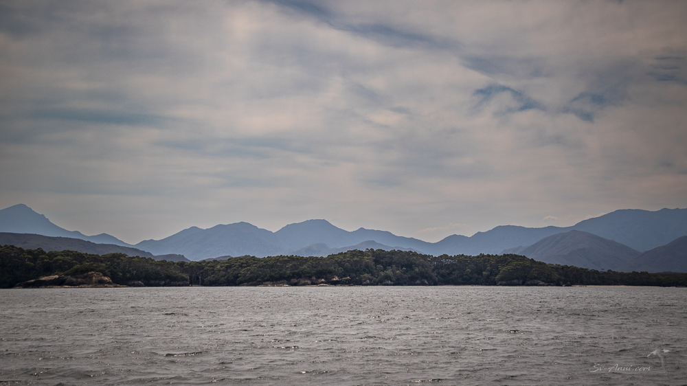 Louisa Bay and distant ranges